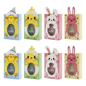 Cajas de dulces de Pascua con diseños de conejitos y pollitos en cuatro colores pastel