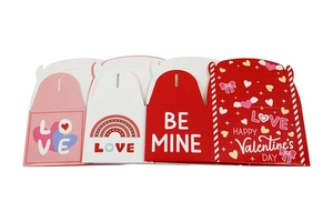 Close-up of four assorted Valentine's Day gift boxes with heart and rainbow patterns
