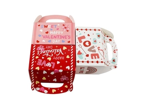 Three handheld Valentine's Day gift boxes in pink, red, and white with heart patterns