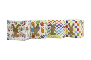 Detail of Easter gift boxes with bunny window showing four colorful festive patterns