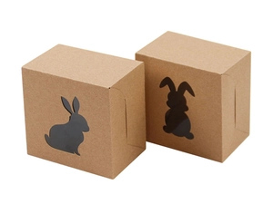Vue détaillée des boîtes cadeaux de Pâques en papier kraft avec lapin ajouré
