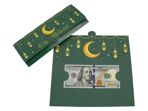 Detail of green and gold moon castle money holder card showing inserted cash