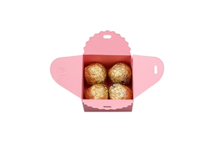 Pink square candy gift box with wavy edges and four gold foil chocolates inside