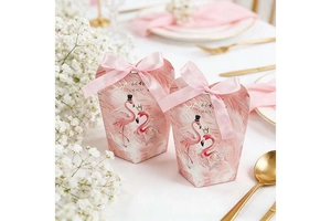 Detail von Flamingo-Süßigkeitenschachteln mit rosa Schleife für Hochzeitsgeschenkboxen
