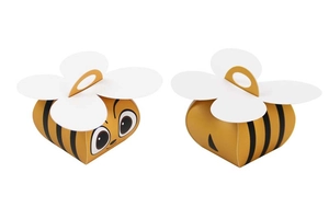 Detail of bee-themed gift boxes with yellow stripes and white petal lid for kids party