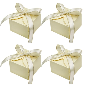 Set of four European cream square gift boxes with wavy edges and golden-trimmed beige bows