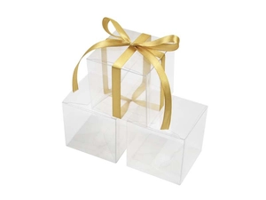 Tre scatole trasparenti in PVC per bomboniere con elegante nastro dorato per nozze