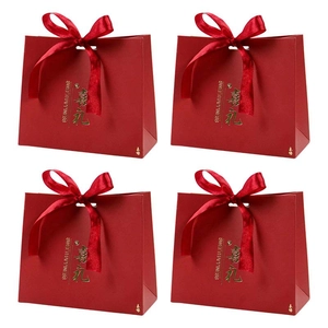 Set of 4 red wedding candy gift boxes with ribbon bows and golden Chinese characters