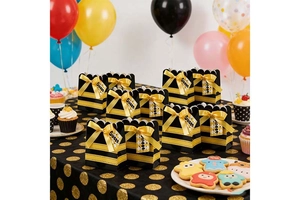 Creative bee themed gift boxes with yellow ribbons and Sweet tags for party candy favors