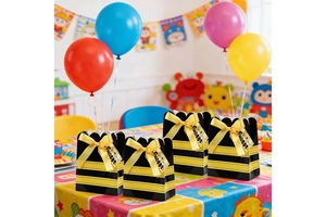 Set of 4 bee-themed party candy bags with black yellow stripes and yellow bows