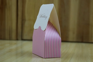 Pink and white striped wedding candy gift box with elegant Wedding text on top