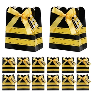 Bee themed gift box set with black and yellow stripes, yellow ribbon and Sweet tag