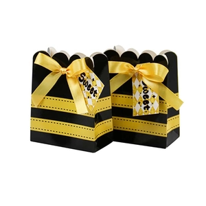 Creative bee themed candy boxes with yellow striped design and sweet gift tags