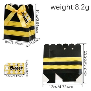 Bee-themed gift box with black and yellow stripes, yellow bow, and 'Sweet' tag