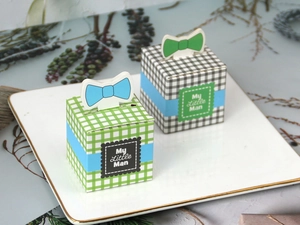 Detail of My Little Man candy boxes with green and black plaid patterns and bowties