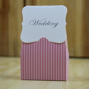 Pink and white vertical striped paper wedding favor box with a silver Wedding tag