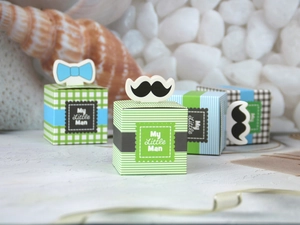 Detail of My Little Man gift boxes with mustache and bowtie decorative tags for boys' parties