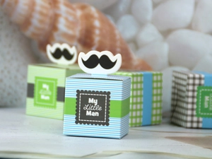 Detail of My Little Man candy boxes with mustache toppers in blue and green patterns
