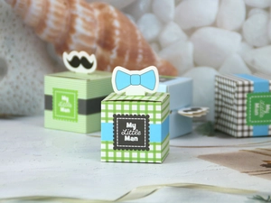 Detail of My Little Man candy boxes with mustache and bowtie accents for baby shower party
