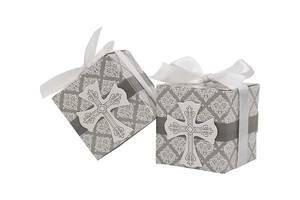 Detailed close-up of European-style cross favor boxes with floral patterns and white ribbons
