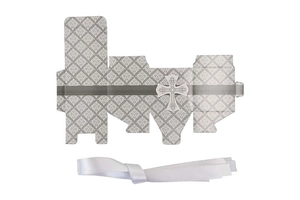 Detailed flat lay of unassembled wedding favor box with grey damask pattern and cross
