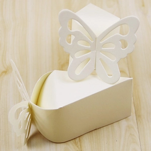 Elegant laser-cut butterfly candy box in ivory white for weddings and parties