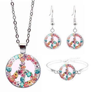 Silver peace sign jewelry set with colorful floral pattern necklace earrings and bracelet