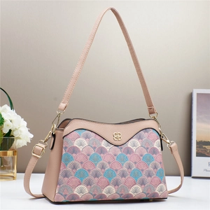 Chic color-block shoulder bag featuring pink lychee leather and fish-scale jacquard fabric