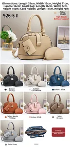 Vista de detalle del set de bolsos de piel PU a rayas con herrajes dorados y diseño interior