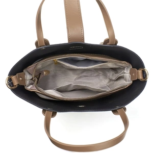 Interior view of large bucket bag showing herringbone lining and functional pockets