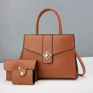 Detailed set of brown PU leather tote bag, clutch and card holder with gold hardware