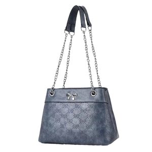 Navy blue embossed bow tote bag with silver chain strap and metal bow hardware