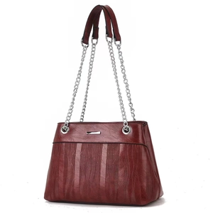 Burgundy pleated faux leather crossbody bag for women with silver metal chain strap