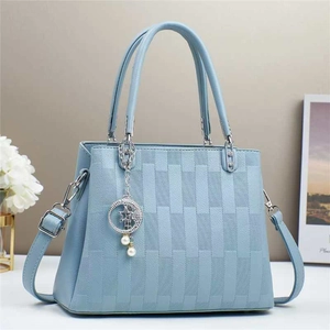 Light blue multi-layer shoulder bag with embossed brick texture and pearl charm