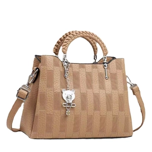 Multi-layer large capacity crossbody bag in apricot with woven handles and bear charm
