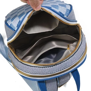 Internal view showing large storage capacity and pockets of checkerboard backpack