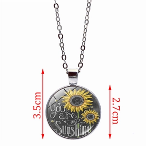 Dimensions du pendentif tournesol de 3,5 cm avec citation You Are My Sunshine