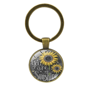 Porte-clés tournesol en bronze antique avec citation You Are My Sunshine et verre