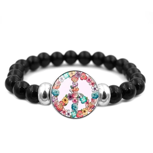 Elastic beaded peace sign bracelet with black round beads and floral metal charm pendant