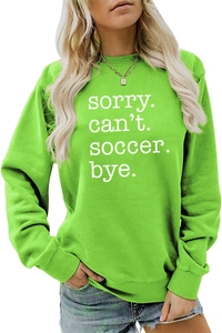 Detail of Sorry Can't Soccer Bye text print on neon green crewneck sweatshirt