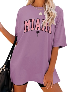 Detail of loose fit purple MIAMI t-shirt showing graphic print and textured fabric