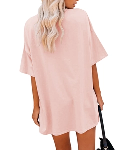 Rear view of loose fit pink short sleeve t-shirt with drop shoulder and round neck