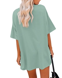 Back view of mint green oversized cotton T-shirt featuring dropped shoulder and round neck