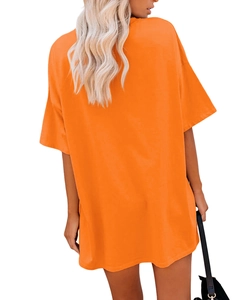 Rear view of an oversized orange cotton t-shirt for women with a relaxed loose fit style