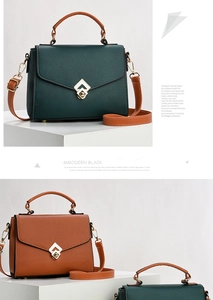 Detail van elegante crossbodytas met ruitvormige metalen gesp en rond handvat