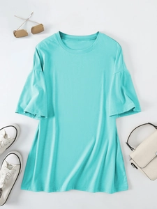 Flat lay of a loose round neck t-shirt in bright cyan with trendy ruffled bell sleeves