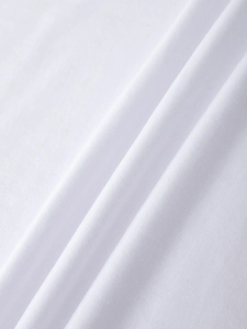 Close-up of soft white cotton knit fabric texture with natural drape for women's t-shirt