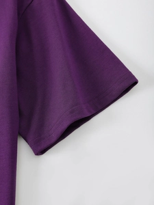 Detail view of purple cotton T-shirt featuring high-quality double-needle stitched cuffs