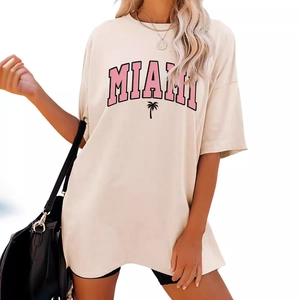 Oversized beige Miami T-shirt with pink letters and palm tree print for women