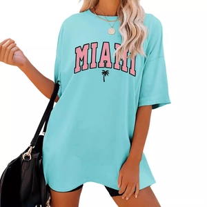 Light blue oversized t-shirt with pink Miami logo and palm tree print in relaxed fit